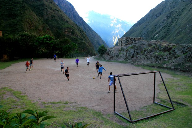 Playing football with the porters up in the mountains on the Inca Trail