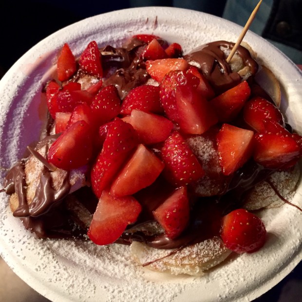 OH-EM-GEE at the deliciousness of these Dutch pancakes smothered in icing sugar, chocolate sauce and strawberries from the Southbank Christmas market